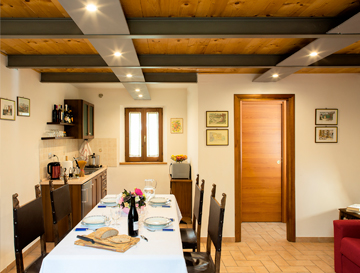 Holiday apartments for families with loft, equipped kitchen, garden, barbecue